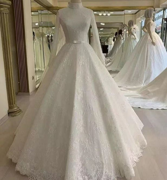 Elegant, sophisticated and modest wedding dress.